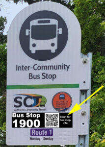 Picture showing bus stop sign with number and QR code